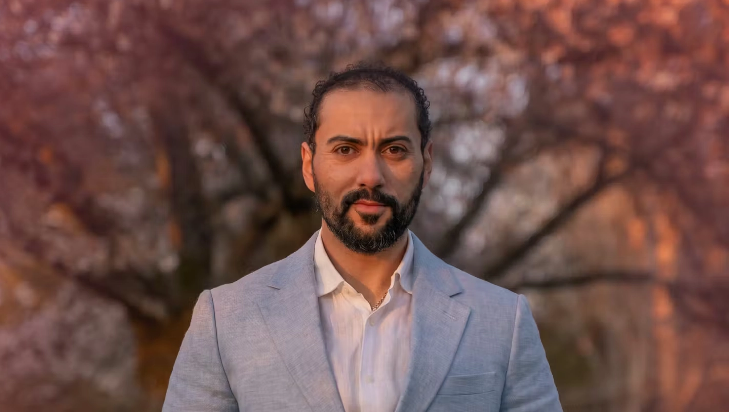Reduced-fee therapy student therapist Laith Eskandar by trees at sunset | Blog | CSP