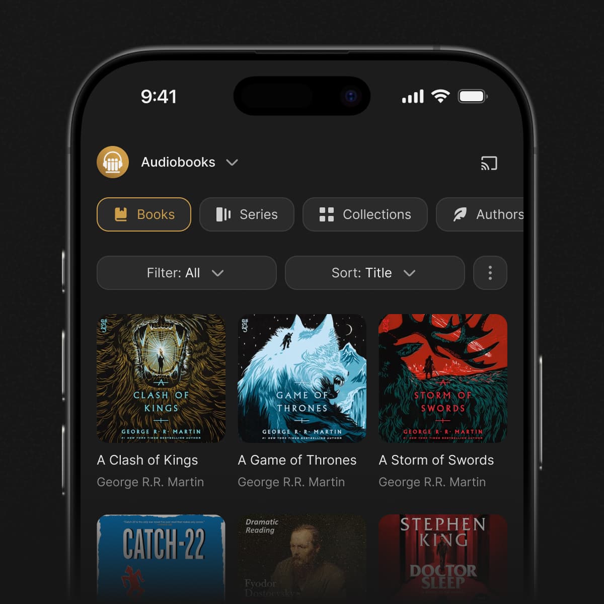 An iPhone showing a grid of audiobooks in a minimalist layout
