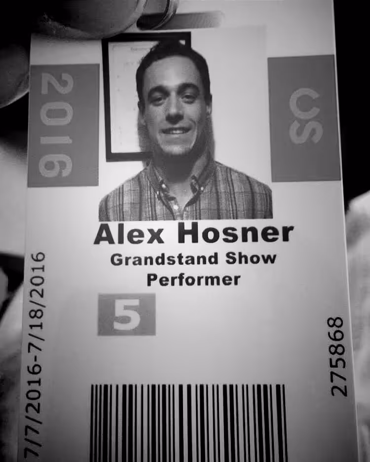 ID badge with photo of man, labeled Alex Hosner, Grandstand Show Performer, dated 2016 with barcode and number 275868.