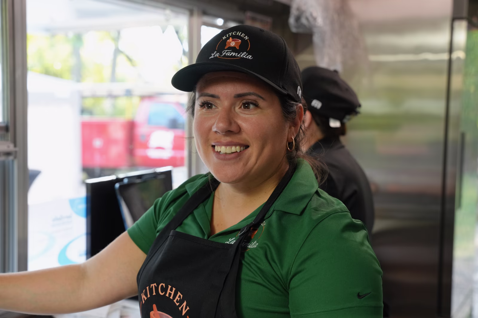 Kitchen La Familia team member at Summer Farewell Fest event hosted by Kitchen La Familia, Grand Rapids Premiere Mexican Caterer