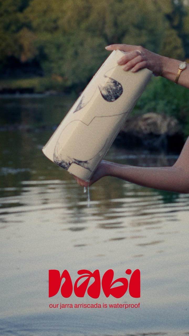 A jar was filled with water and turned around to show that the jar is waterproof