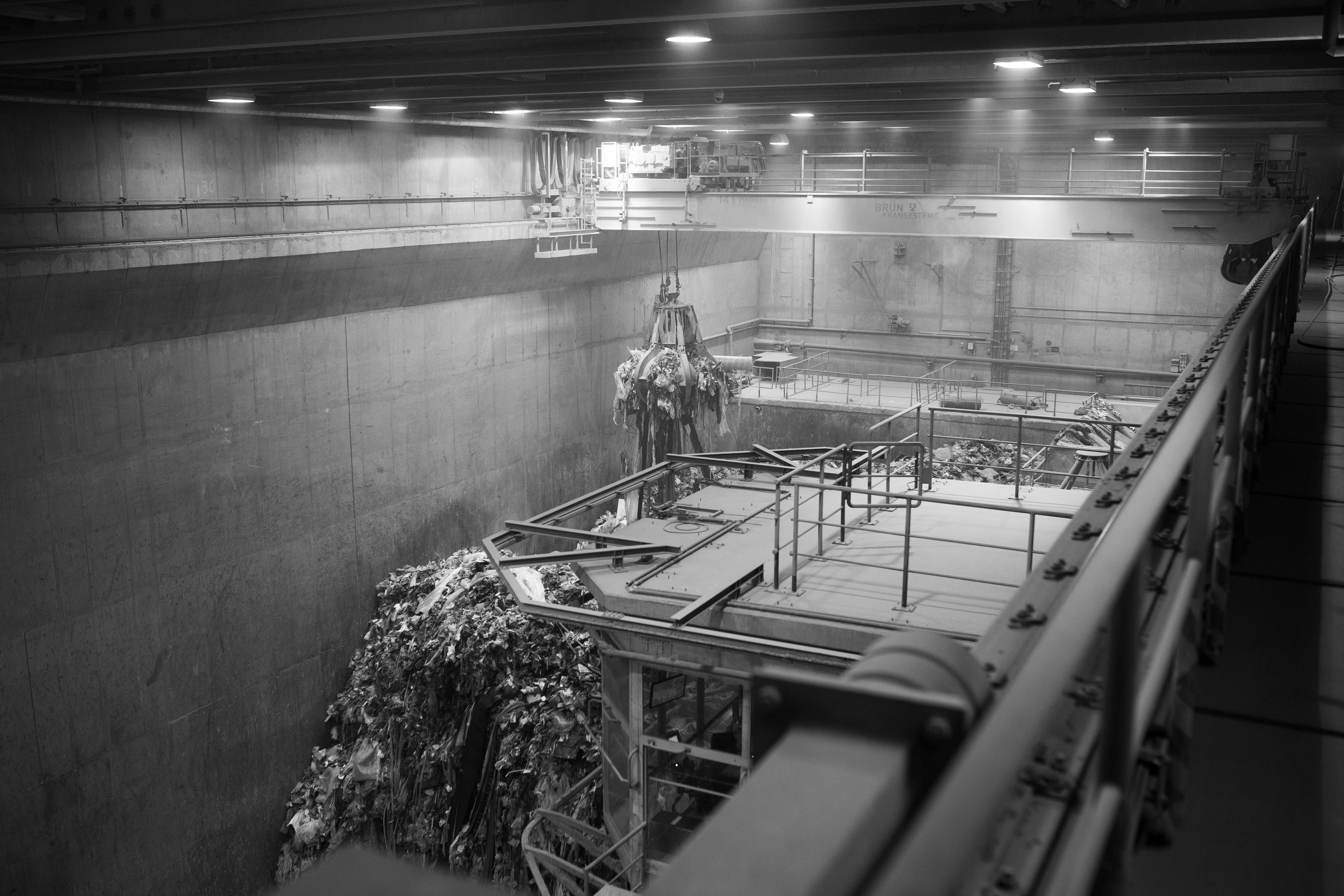 seven people sitting or standing in different groups are talking to each other
