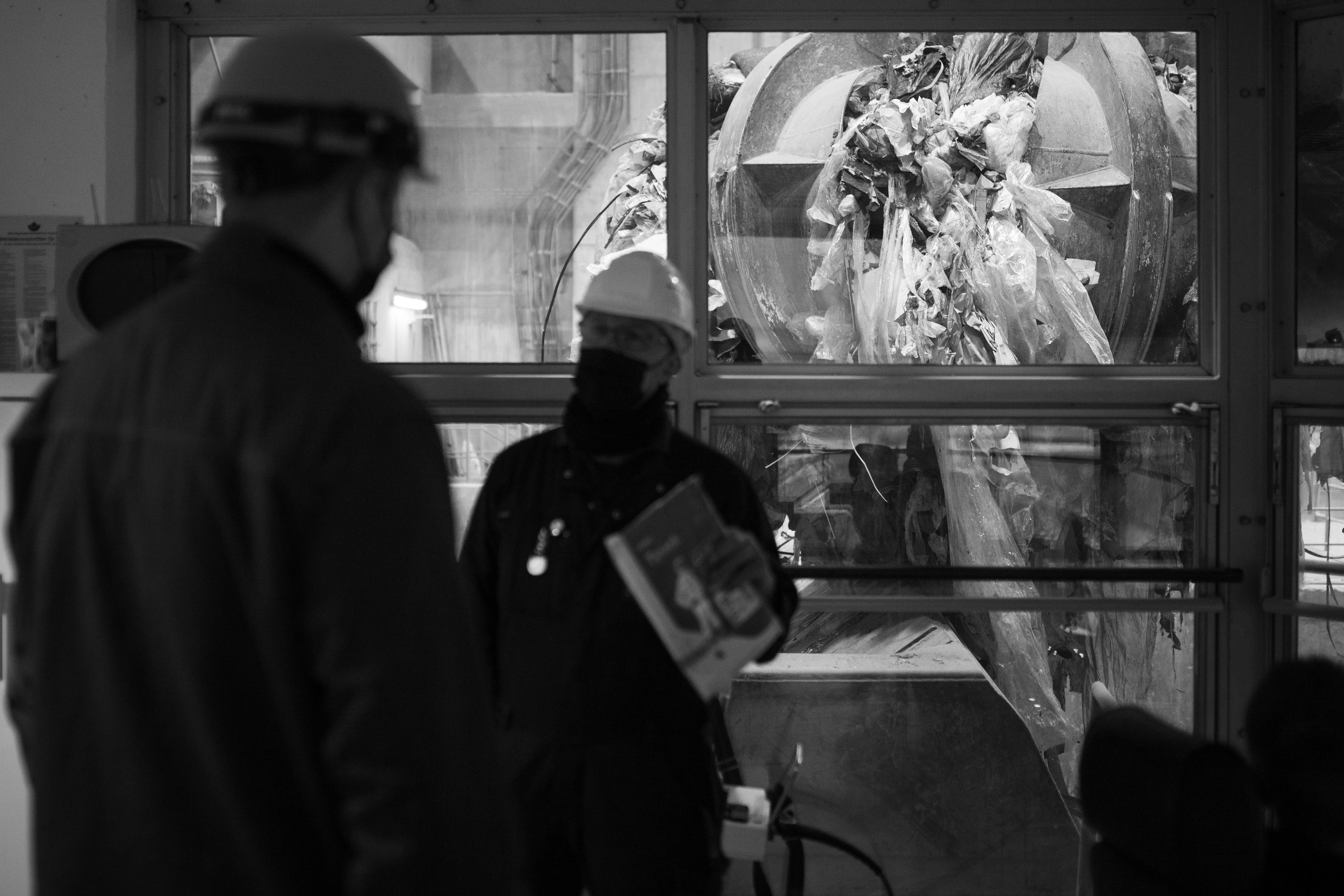 A woman is talking to a man