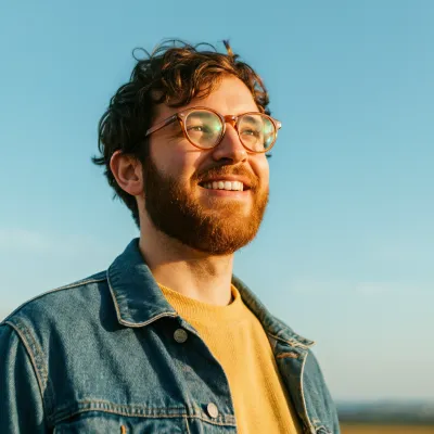 Portrait of a smiling man used in BYQ Supply testimonial section.