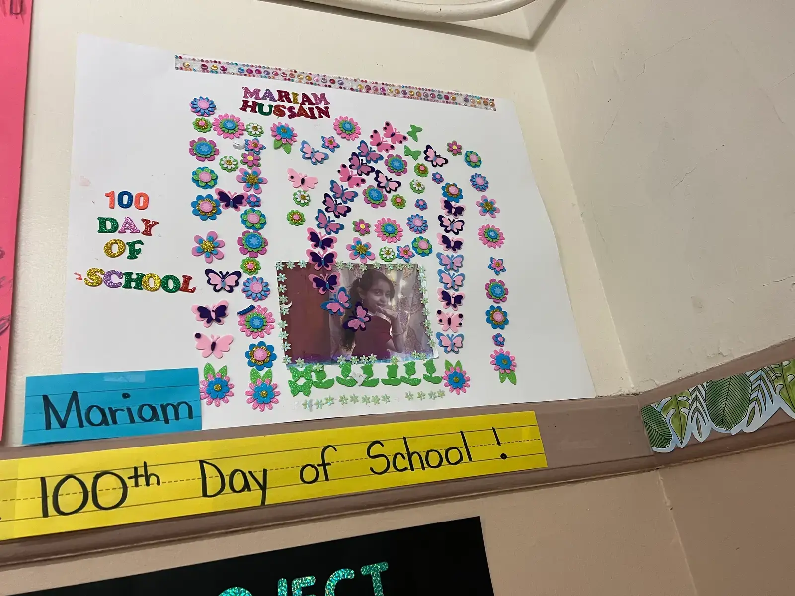 Student Mariam Hussain 100th Day of School poster with stickers