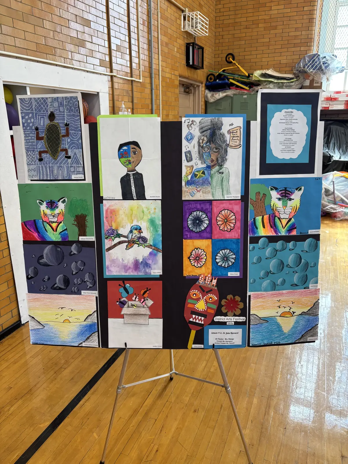 Student artwork display board at District Arts Festival exhibition