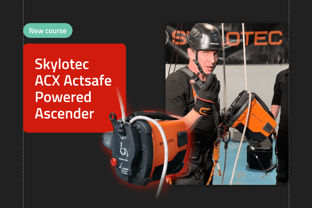 A man in black gear demonstrates the Skylotec ACX Actsafe Powered Ascender during a training course.