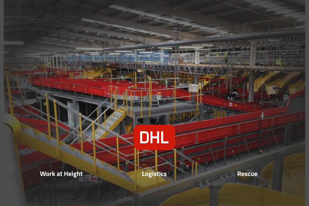 Busy warehouse with yellow and red slides, ladders, steps and complex structures