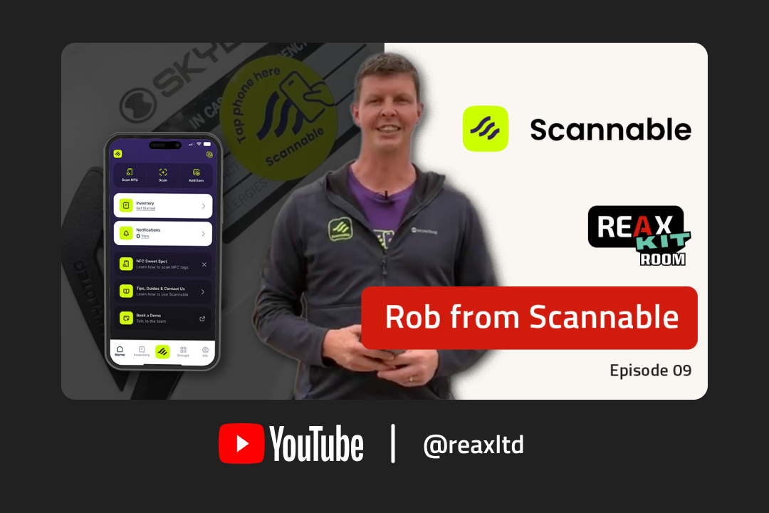 Rob Stirling smiling with a phone of the Scannable app and words ‘REAX kit room’