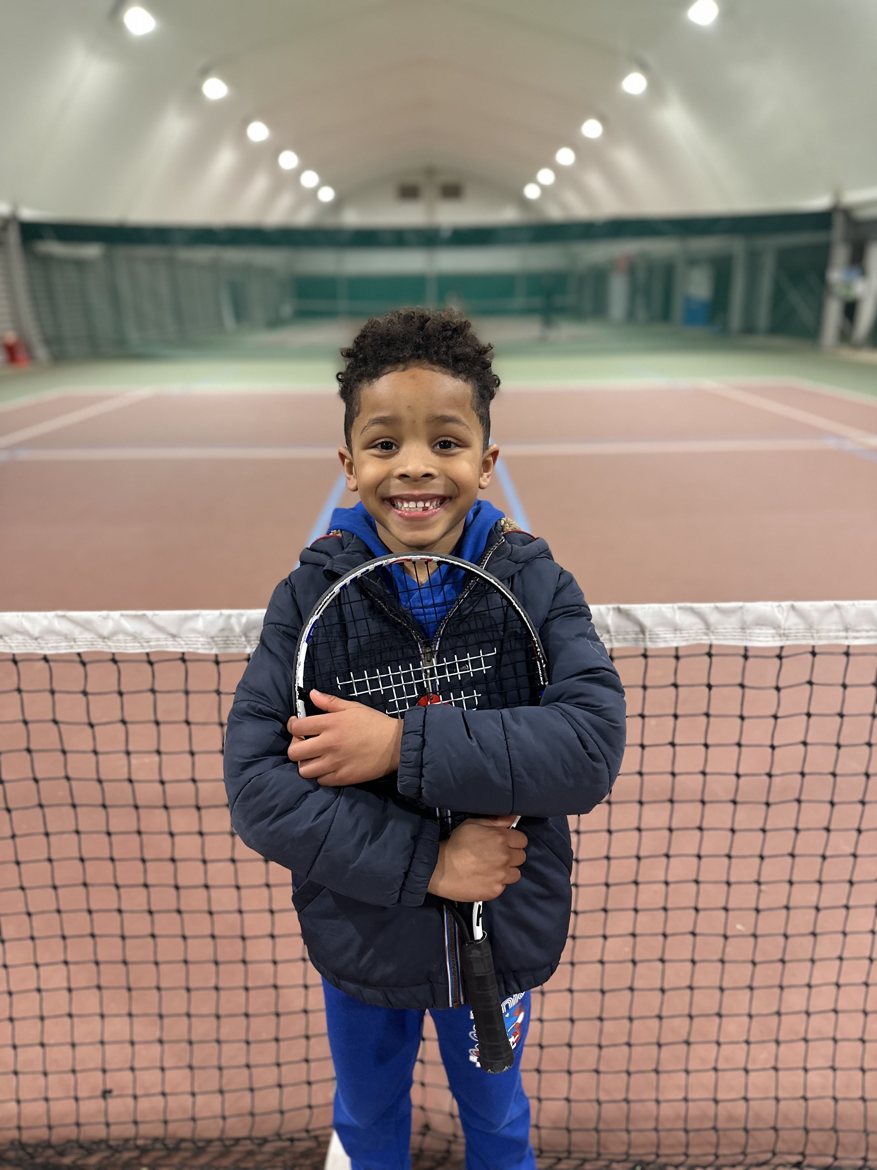 Junior player at a National Tennis indoor venue