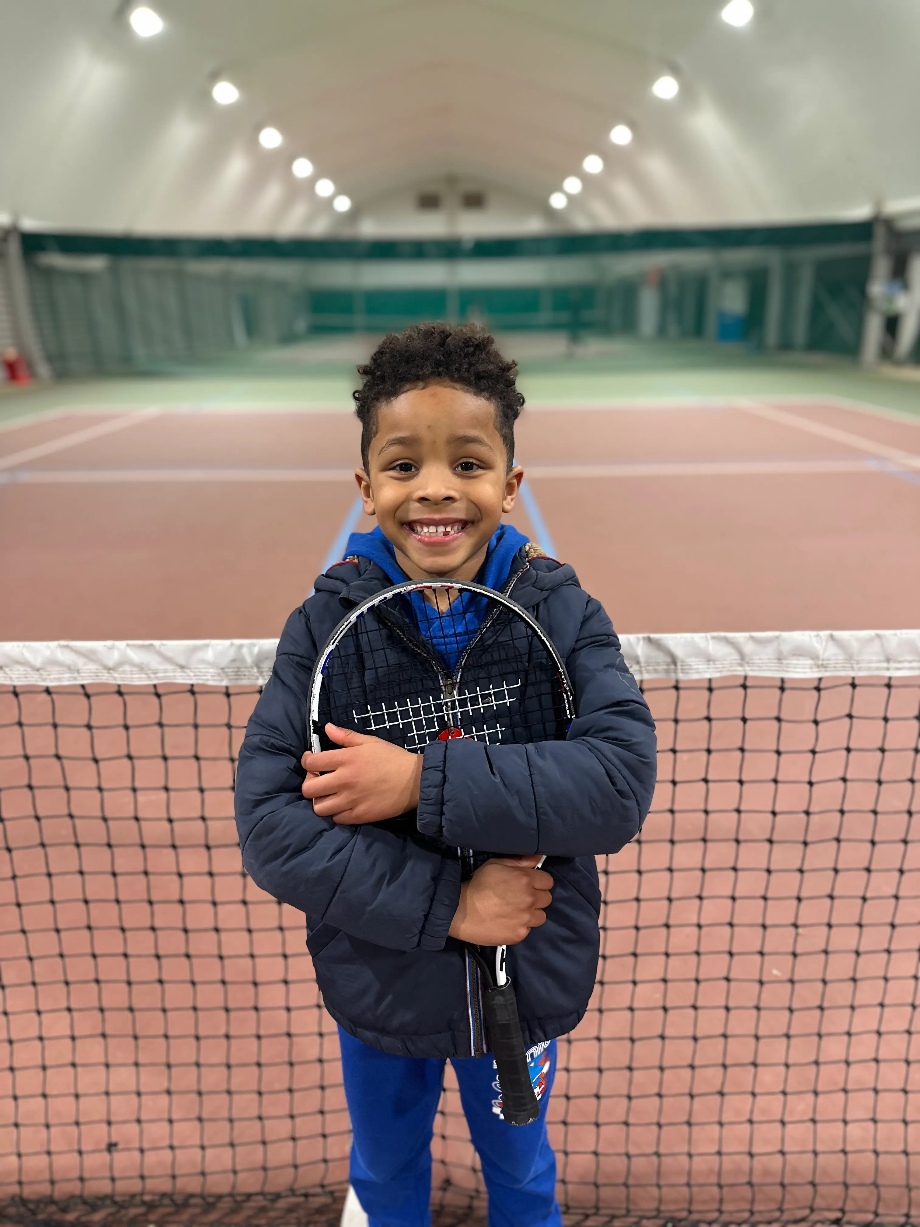 Junior player at a National Tennis indoor venue