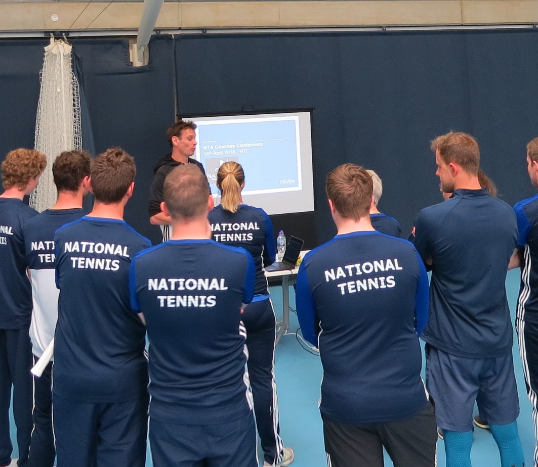National Tennis coaches in a team briefing
