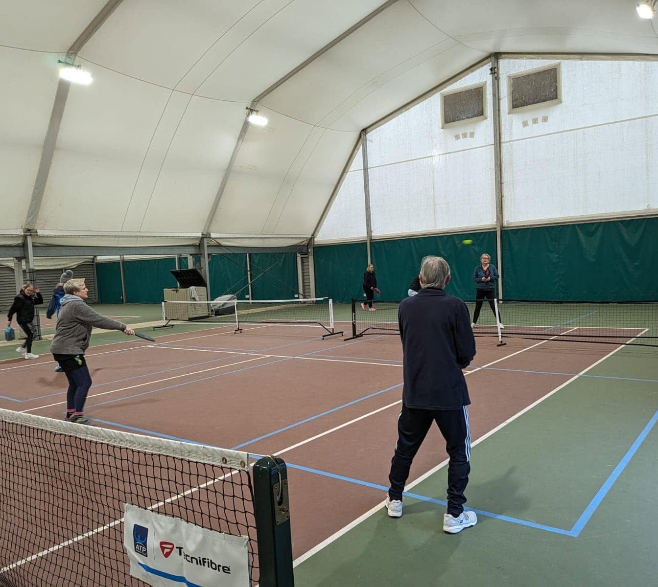 Players on the indoor courts