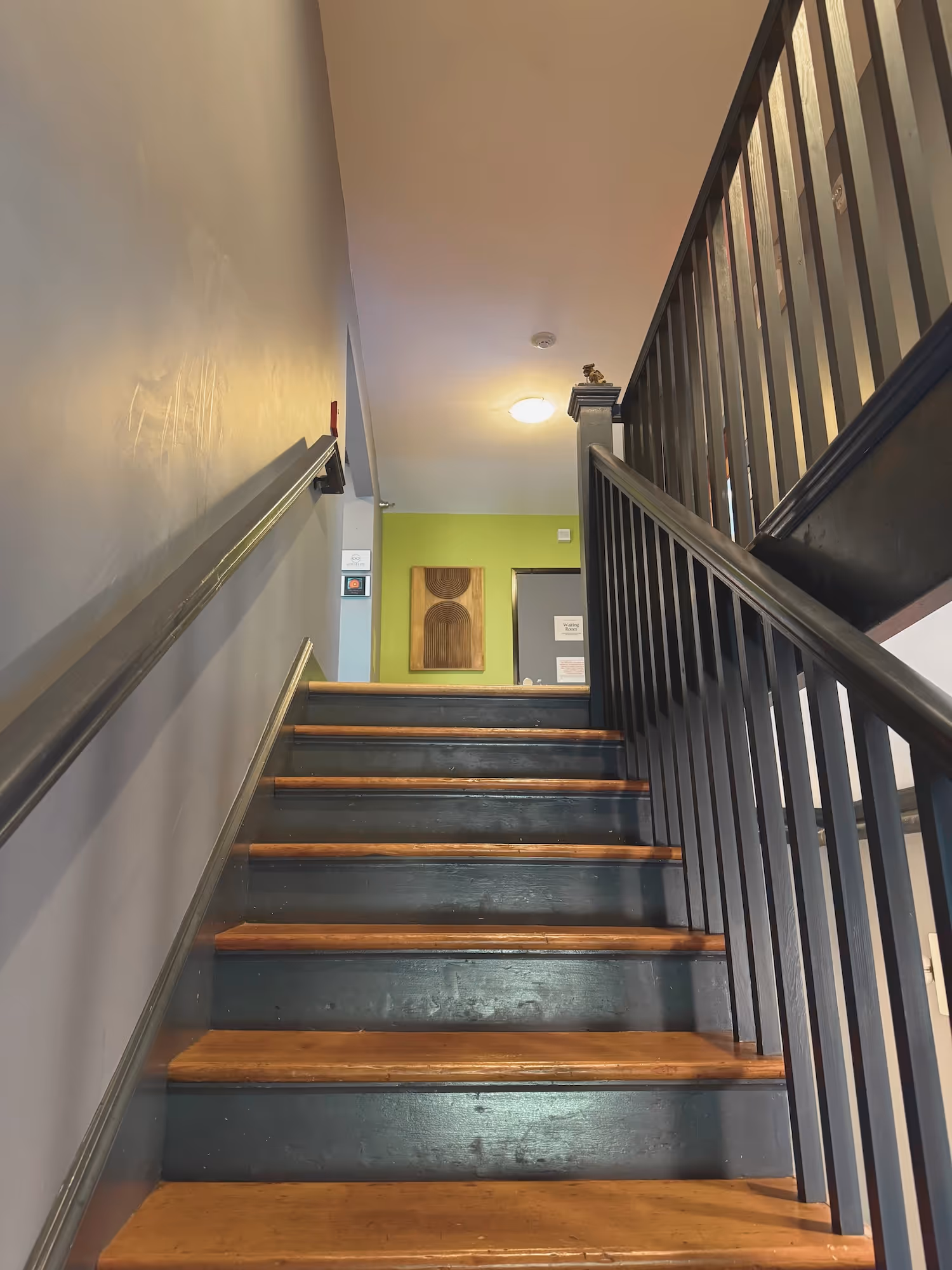 Stairway leading to the second-floor Wild Hart Massage studio
