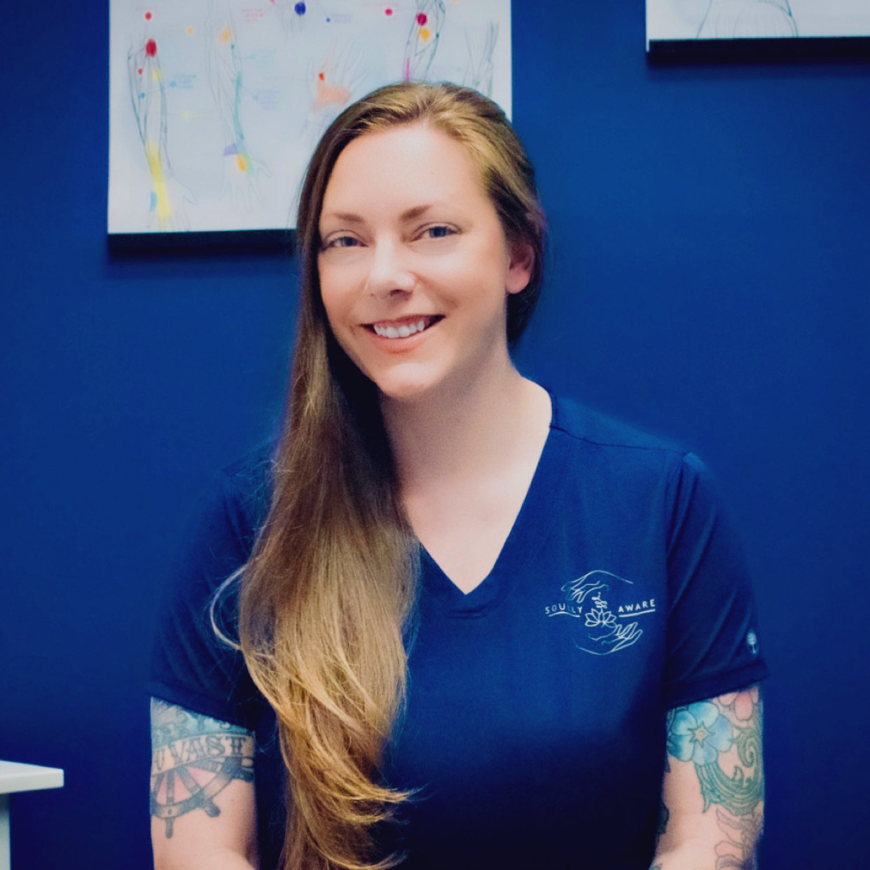 Danika Tkacik smiling in a blue Soully Aware shirt