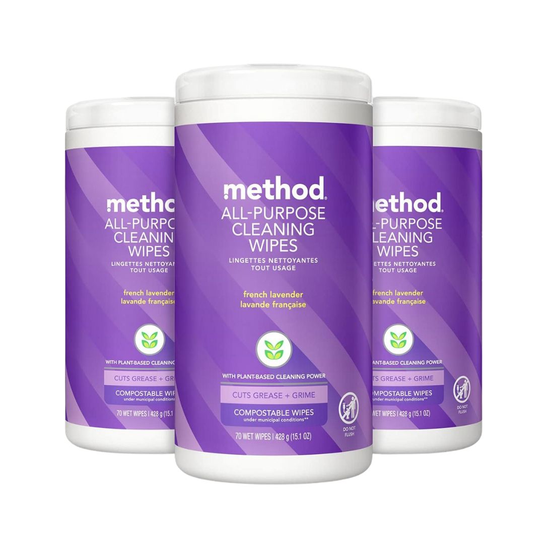 A pack of compostable multi-surface cleaning wipes in a canister, labeled with a French lavender scent, shown for household cleaning.