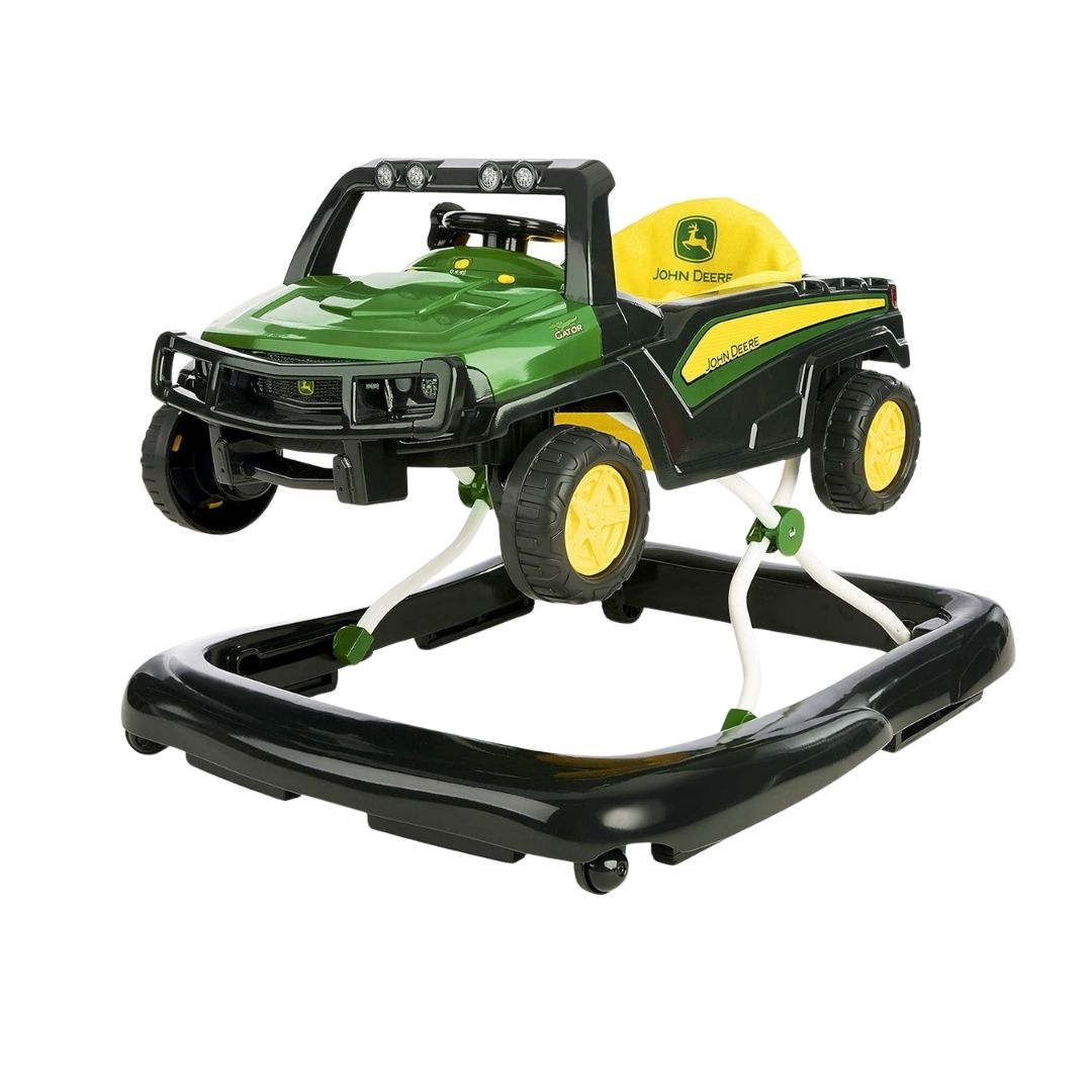 A lifelike baby activity walker shaped like a John Deere Gator, featuring a removable steering wheel play station with lights and sounds.