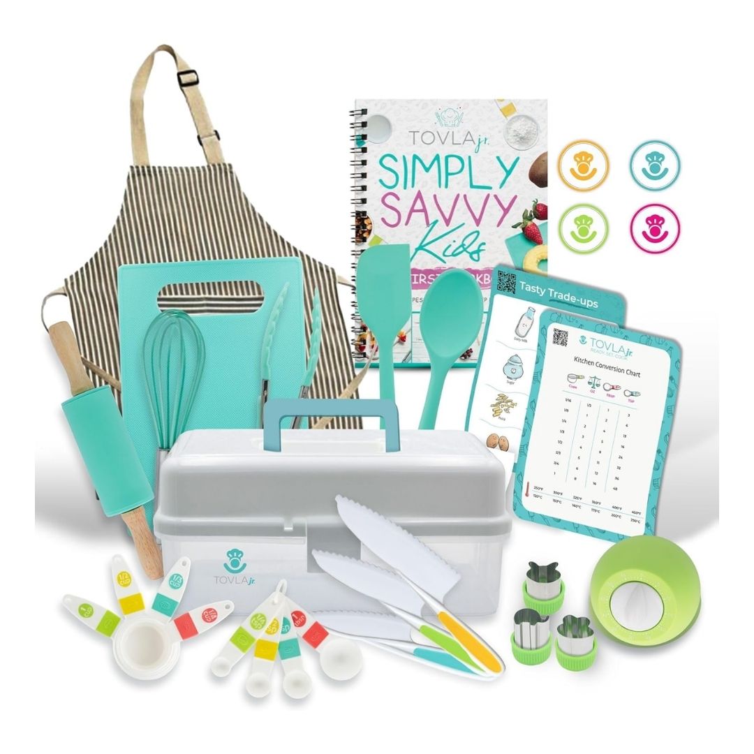 A kids’ cooking and baking set with an apron, timer, kid-safe utensils, visual cookbook, and storage case, arranged on a kitchen counter.