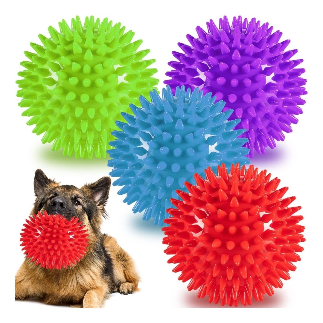 A heavy duty spiked squeaky dog ball made of thick, food-grade rubber with textured spikes and a hidden squeaker inside.