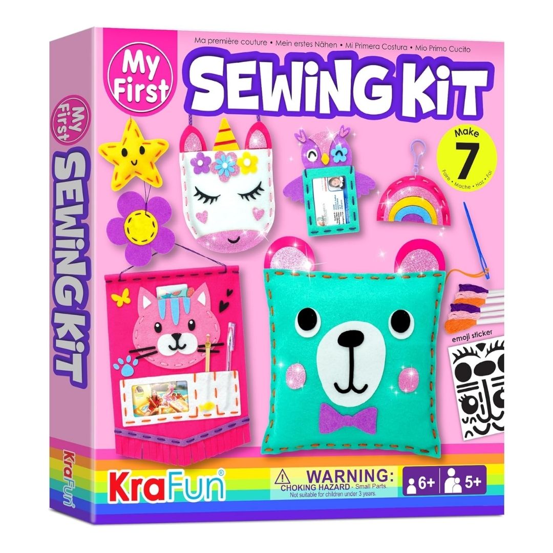 A children's sewing kit with felt pieces, plastic needles, and instructions for making stuffed animals and pillows.