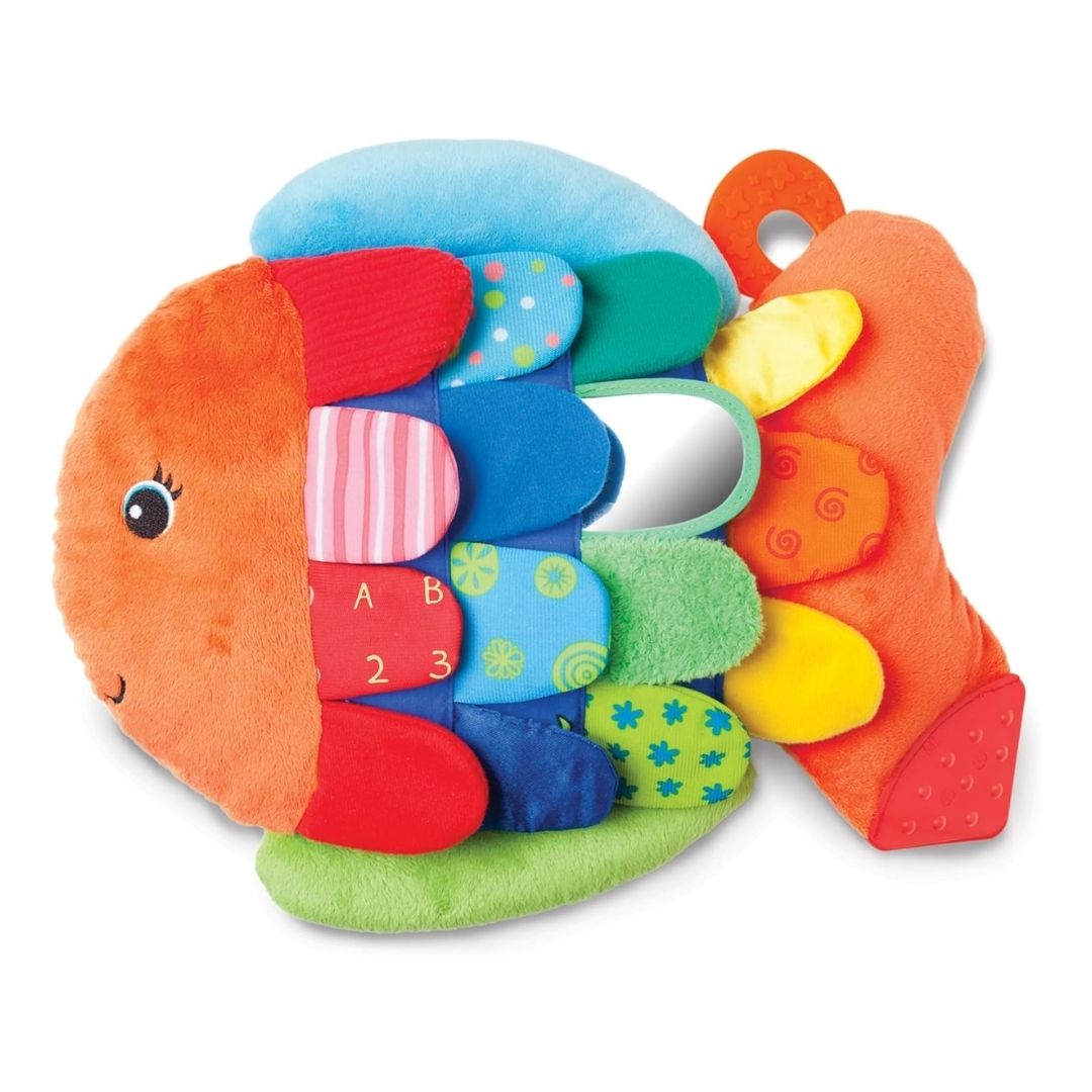 A soft fish-shaped baby book with crinkly scales, a squeaker, and a baby-safe mirror, designed for sensory play.