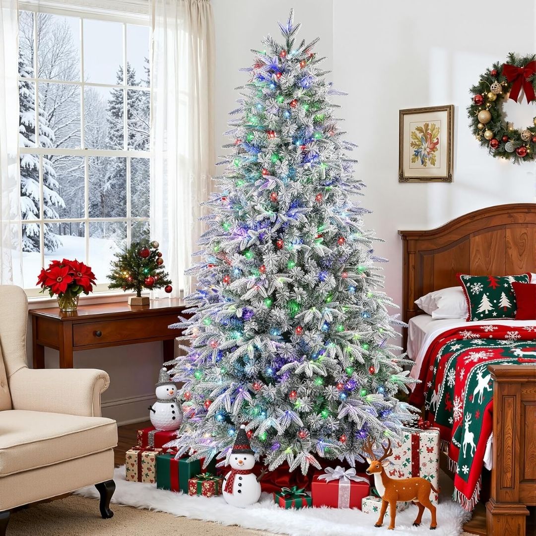 A snow-flocked artificial Christmas tree with layered branches, color changing RGB lights, and a wireless remote control.