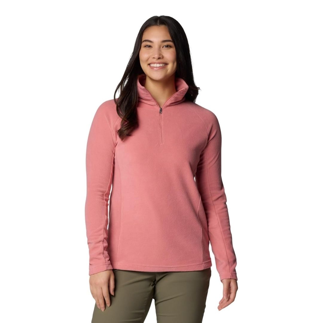A women's fleece half-zip pullover mid-layer, lightweight and breathable, ideal for layering during commutes.
