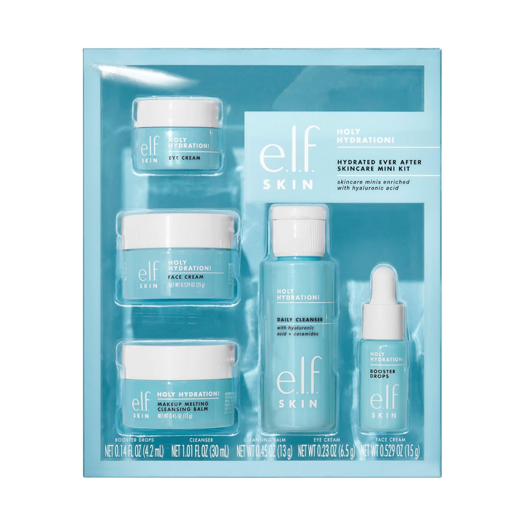 A set of travel-size skincare products including cleanser, makeup remover, moisturizer, booster drops, and eye cream arranged together.