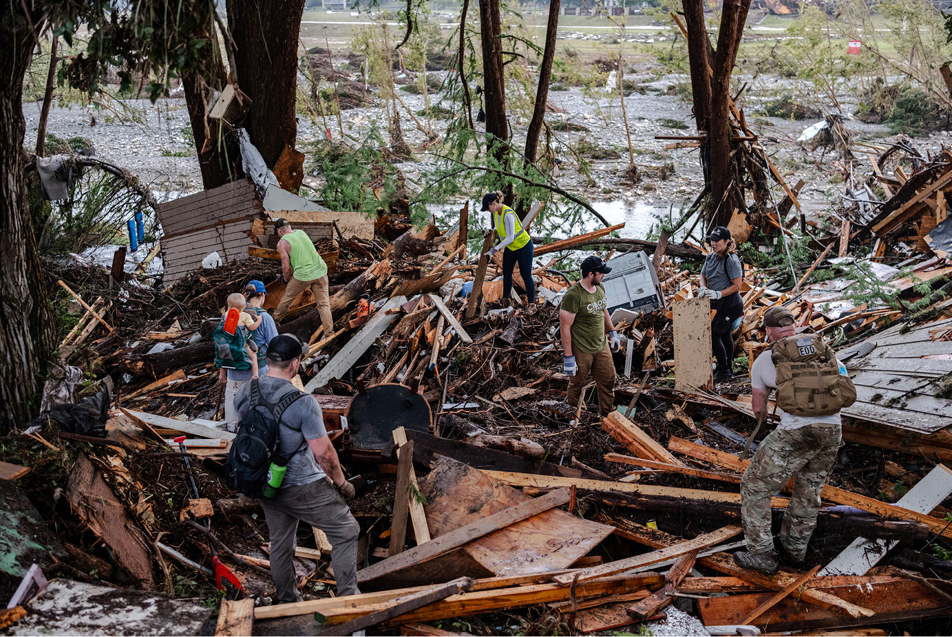 Volunteers clearing debris after flooding in Texas Hill Country.