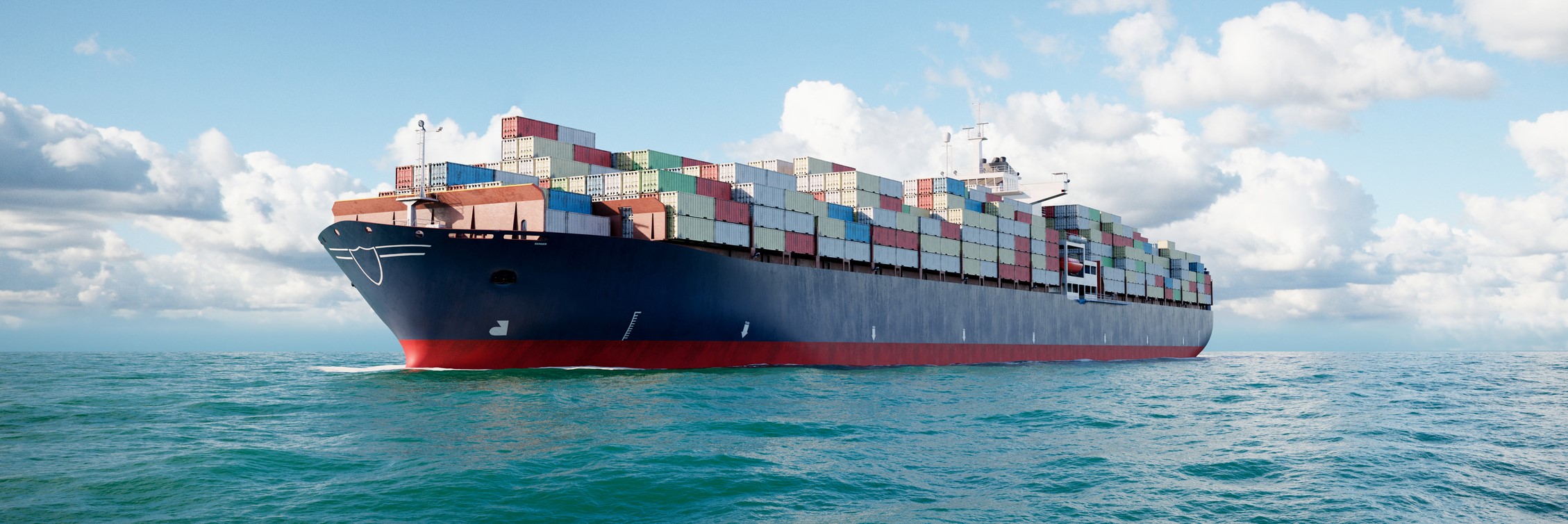 Stacked shipping containers at the Port of Long Beach awaiting drayage pickup