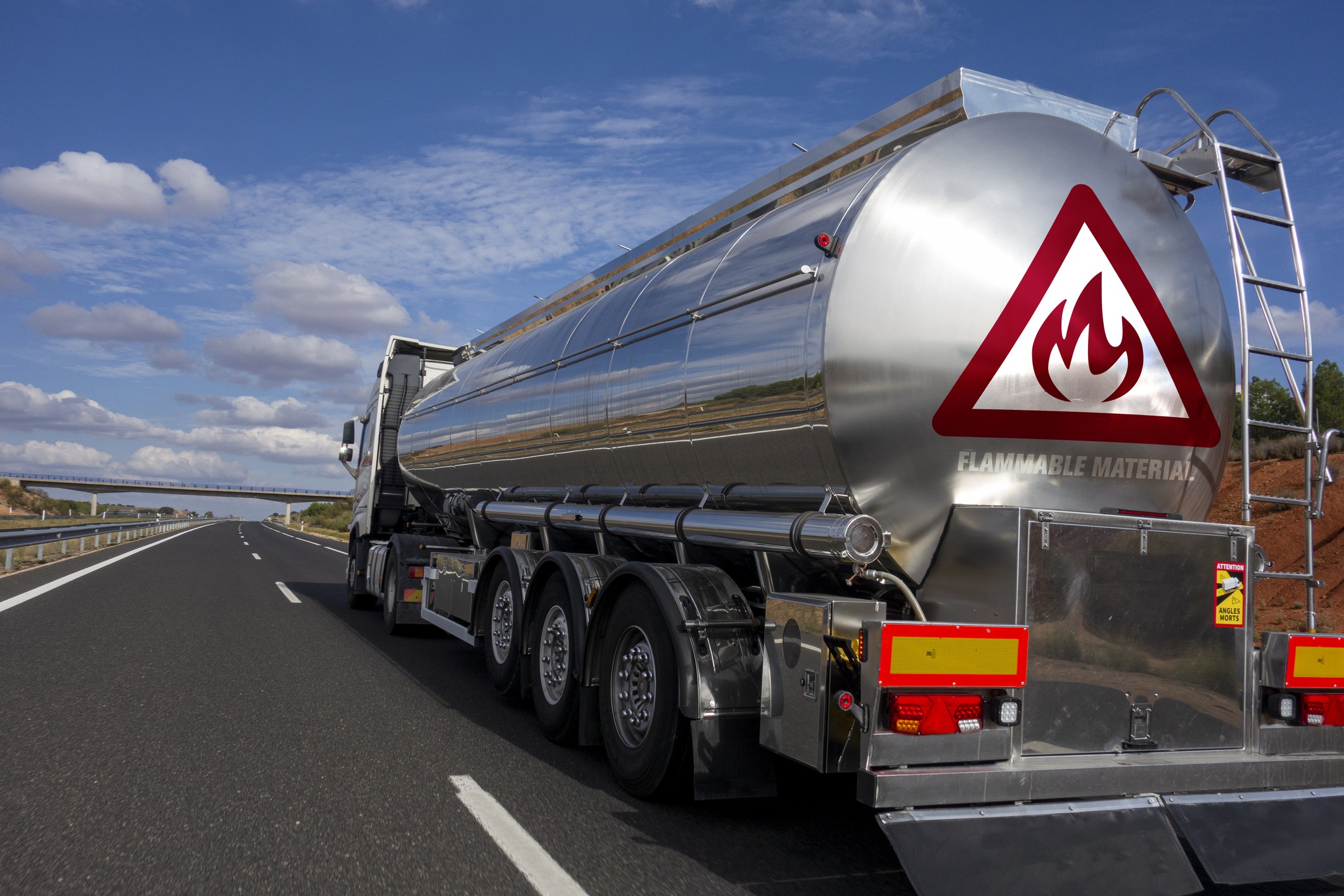Placarded hazmat tanker truck transporting regulated freight from Los Angeles