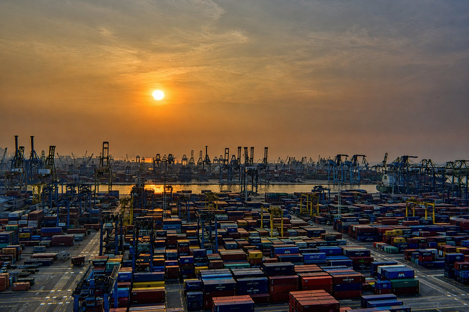 Container yard at sunset at Jeddah Islamic Port, Saudi Arabia to Los Angeles ocean freight