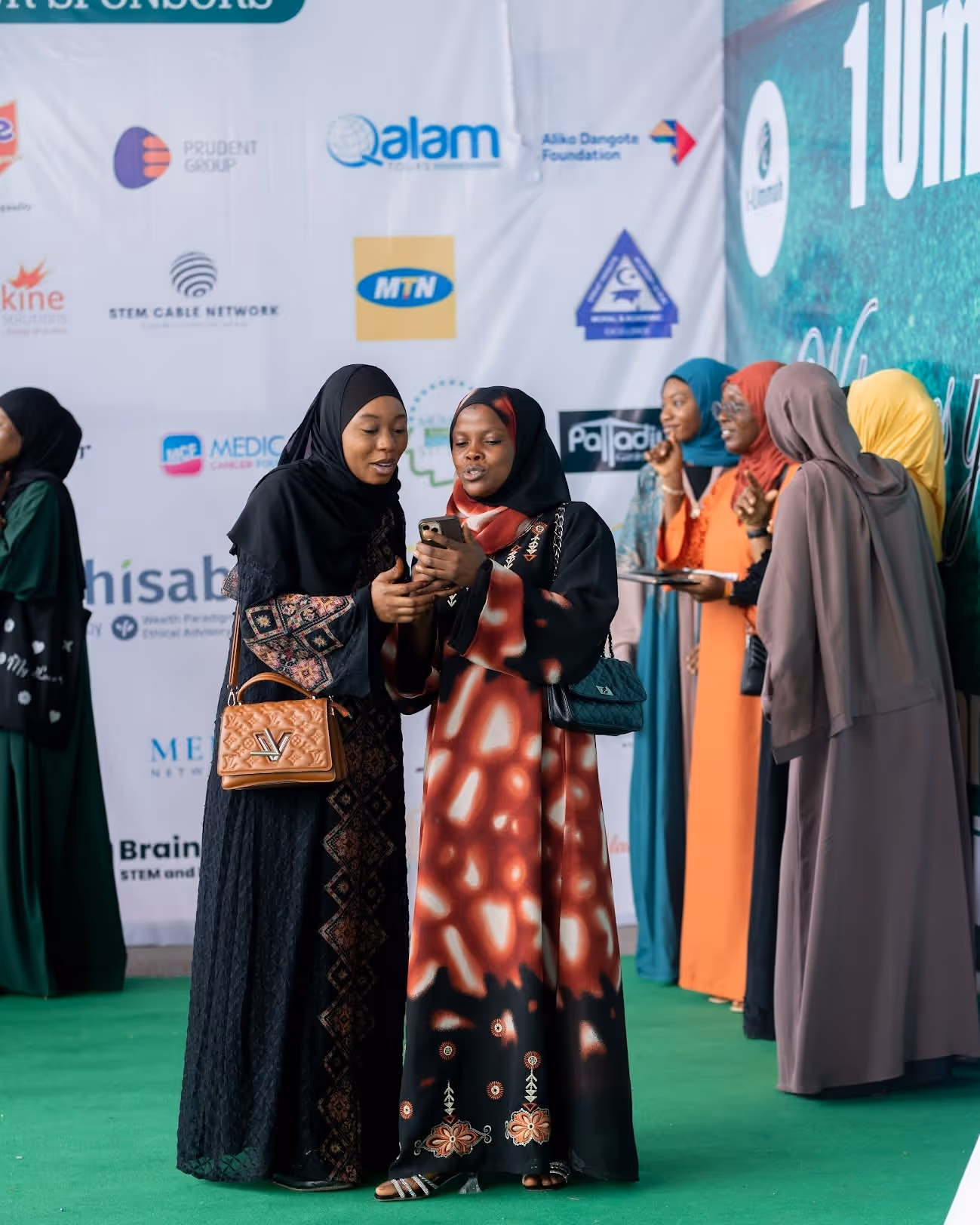 Image of the hall highlighting the sponsor banner