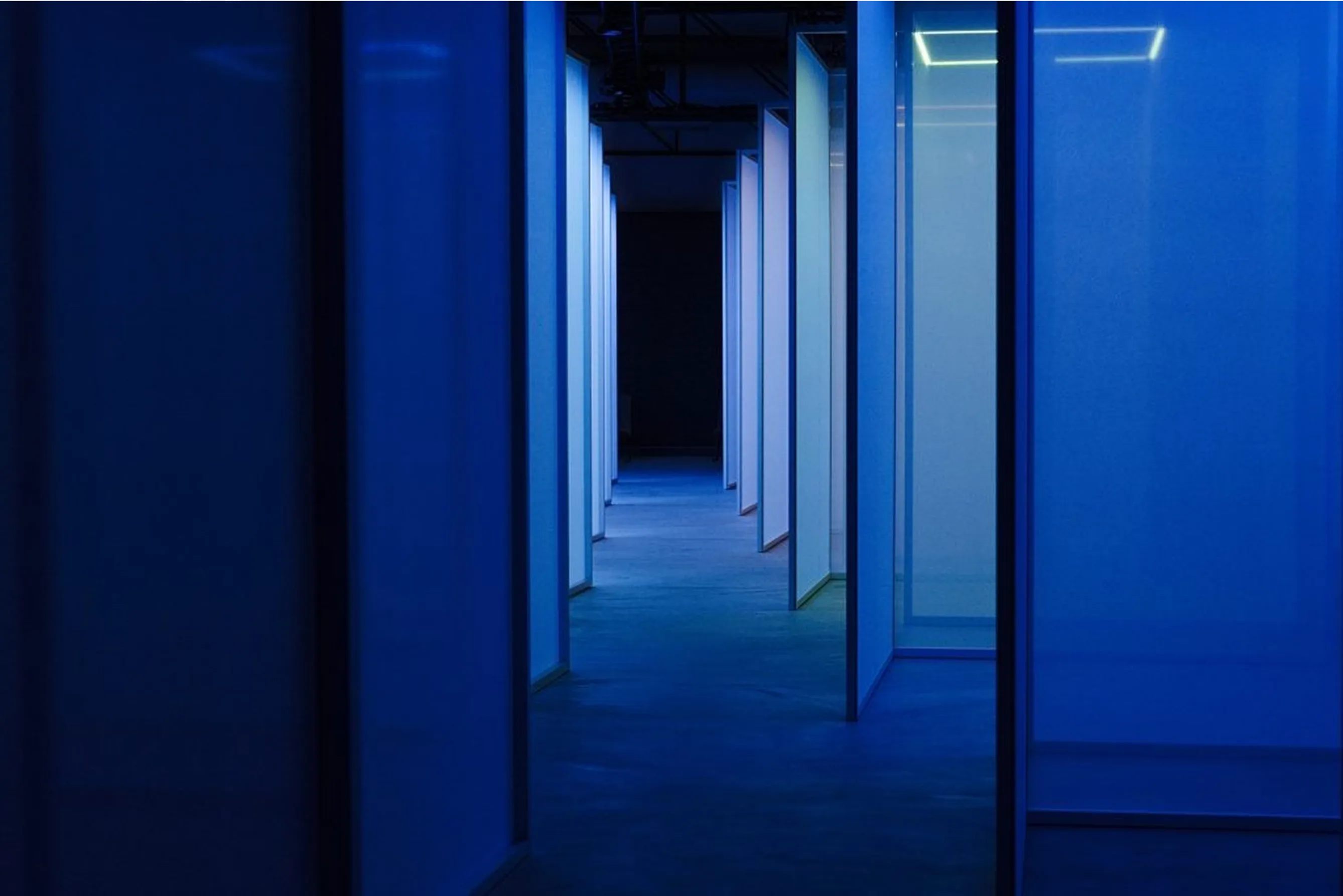 An image of a geometric pattern created by walls that are blue