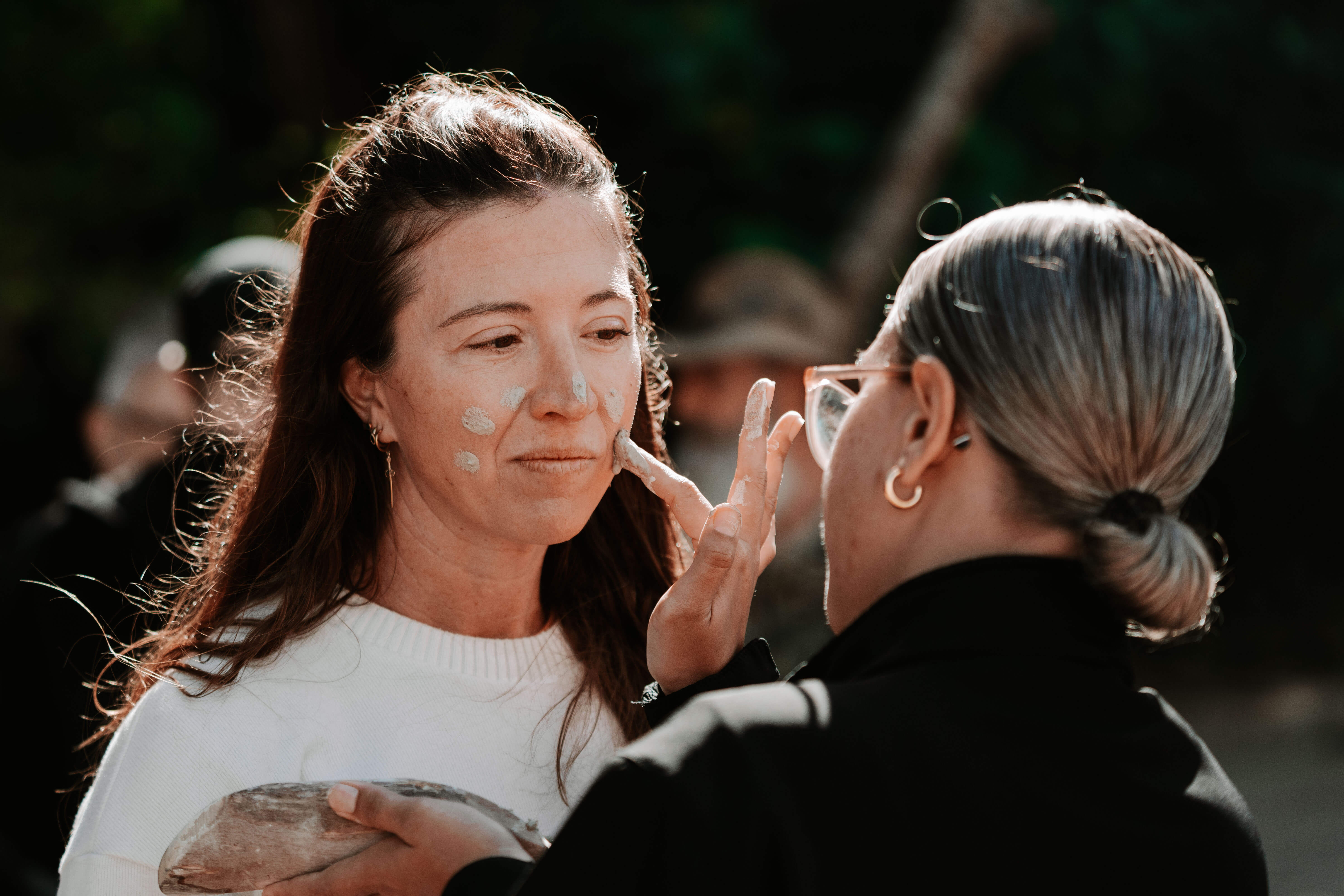 Women gathered outdoors during a Serpent Path session