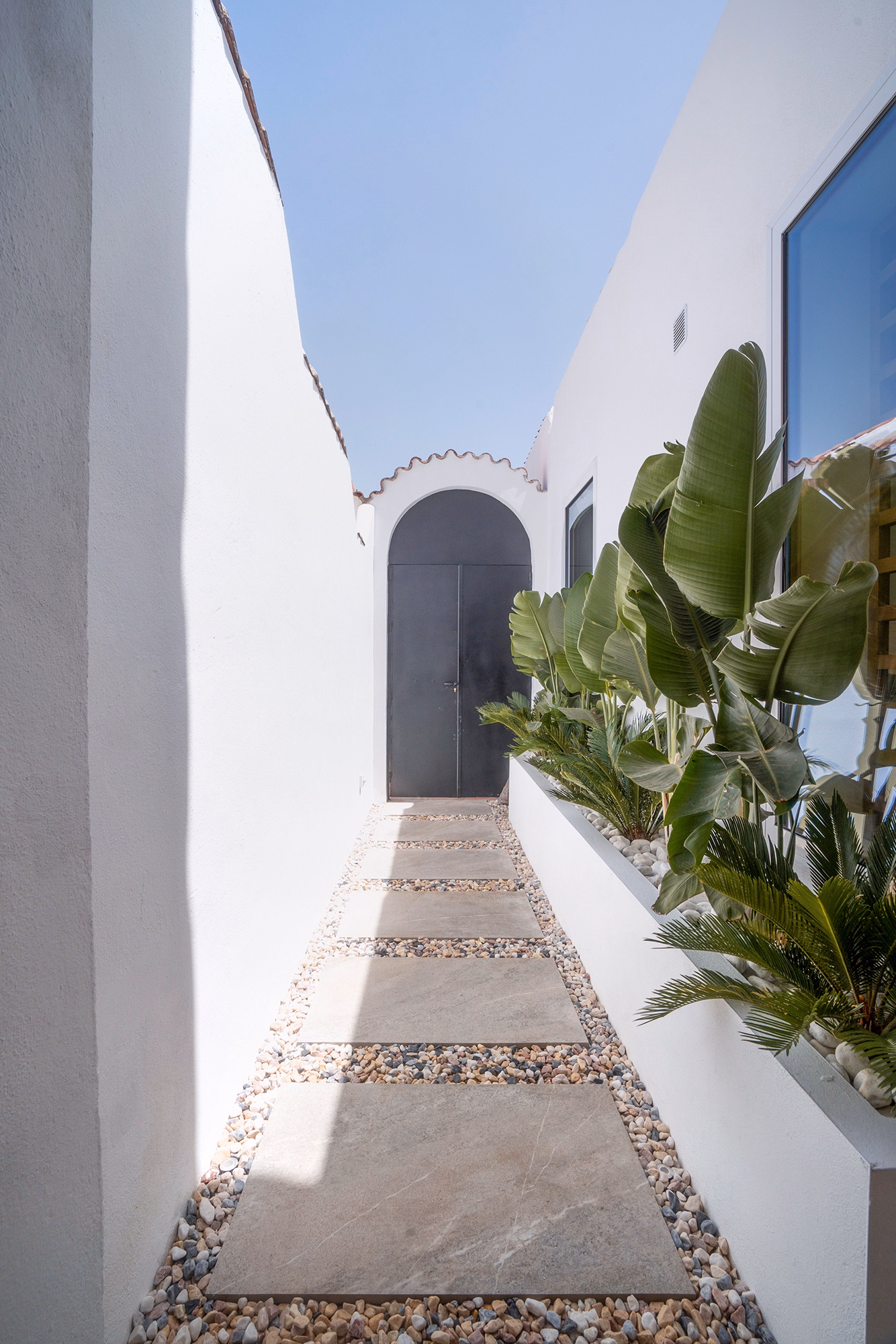 Main entrance of CASA ILIA luxury townhouse in Aloha, Spain