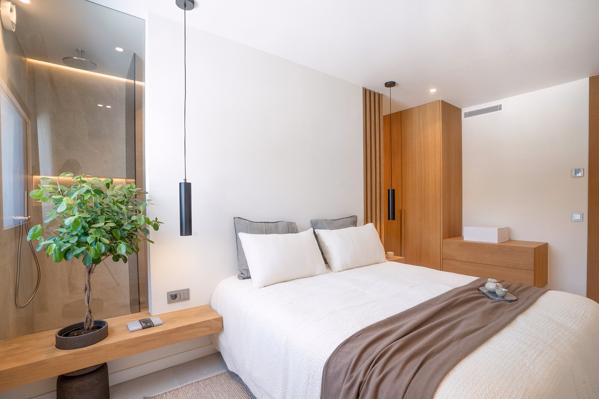 Spacious living room in CASA ILIA townhouse with indoor-outdoor flow