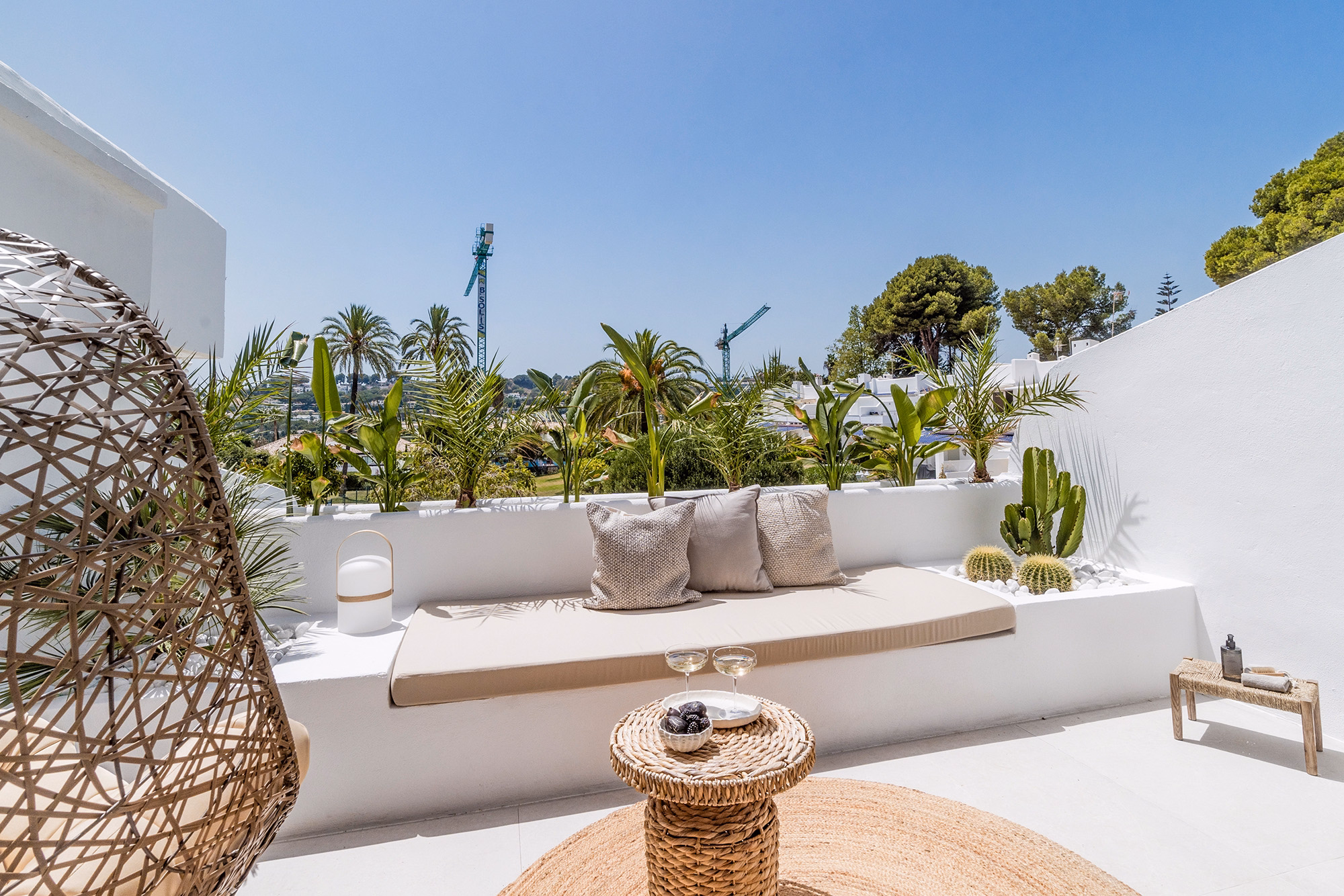 Breakfast setup on the patio at CASA ILIA, overlooking the garden