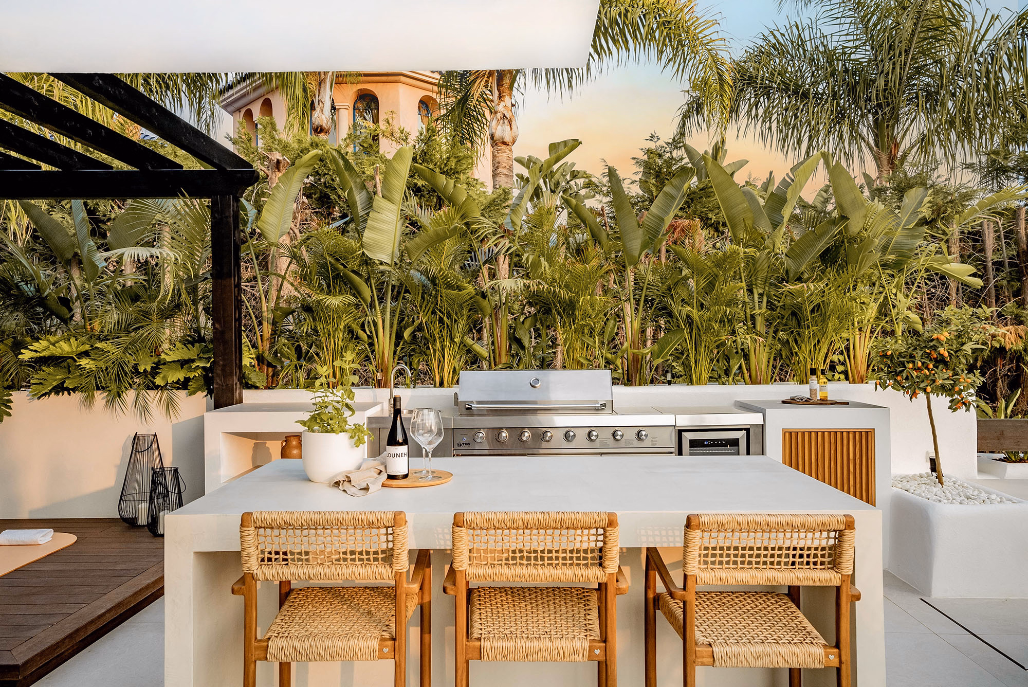 Cocktails by the private pool at Casa Louneh luxury apartment in Marbella