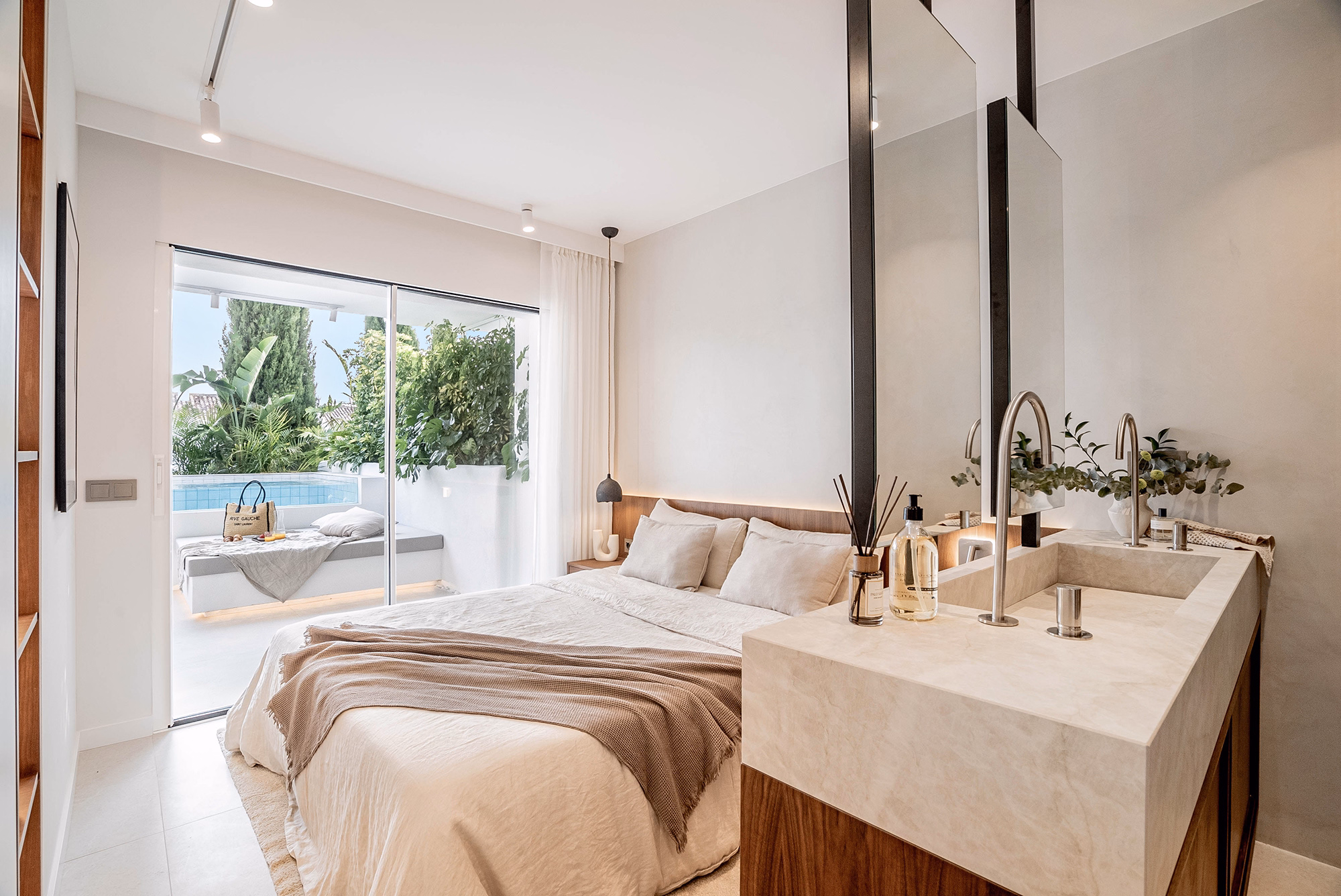 Modern master bathroom with brushed nickel fixtures at Casa Louneh apartment in Marbella