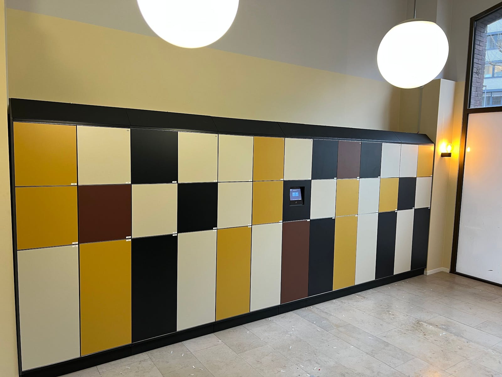 Self-service luggage storage lockers in a hotel environment
