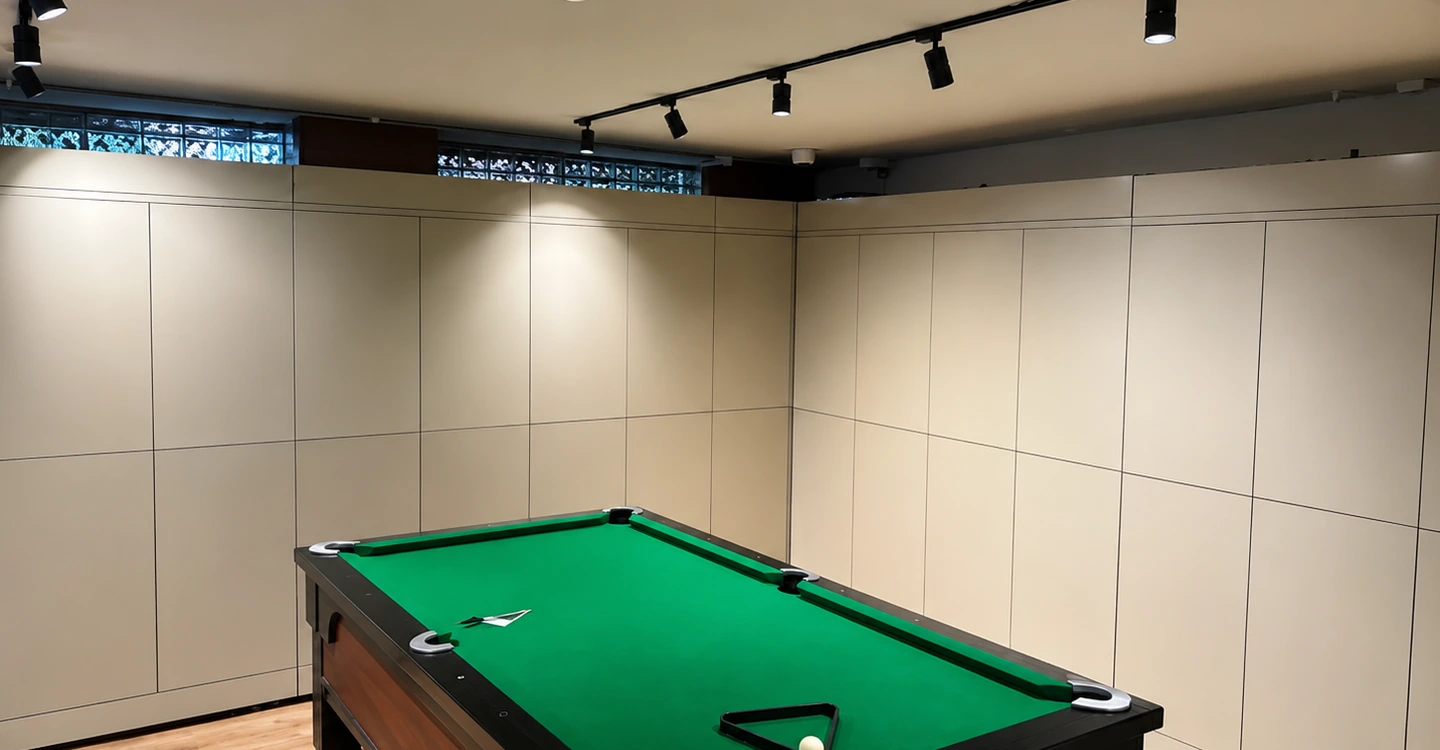 Luggage lockers beside a pool table at Drifter