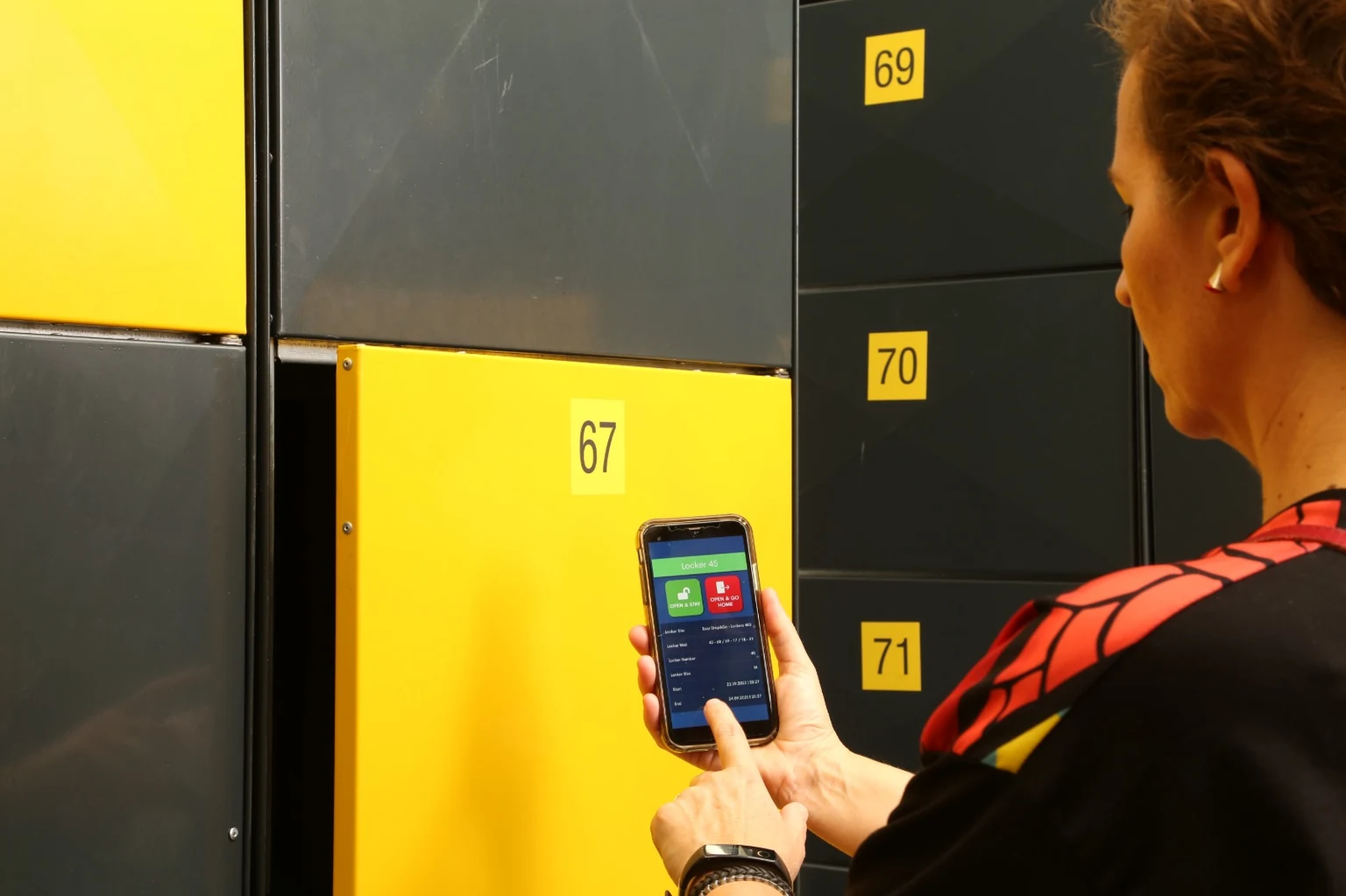 Customer accessing an Easy Drop & Go locker with a mobile phone