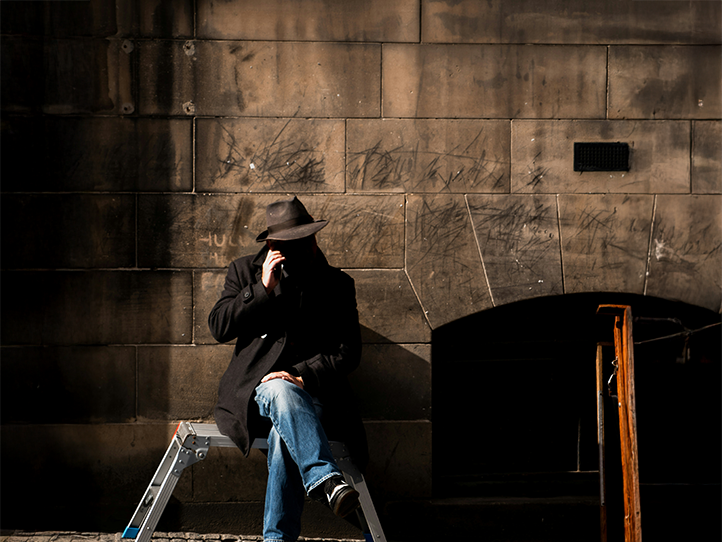 image of busy office with team collaborating (for a fintech company)