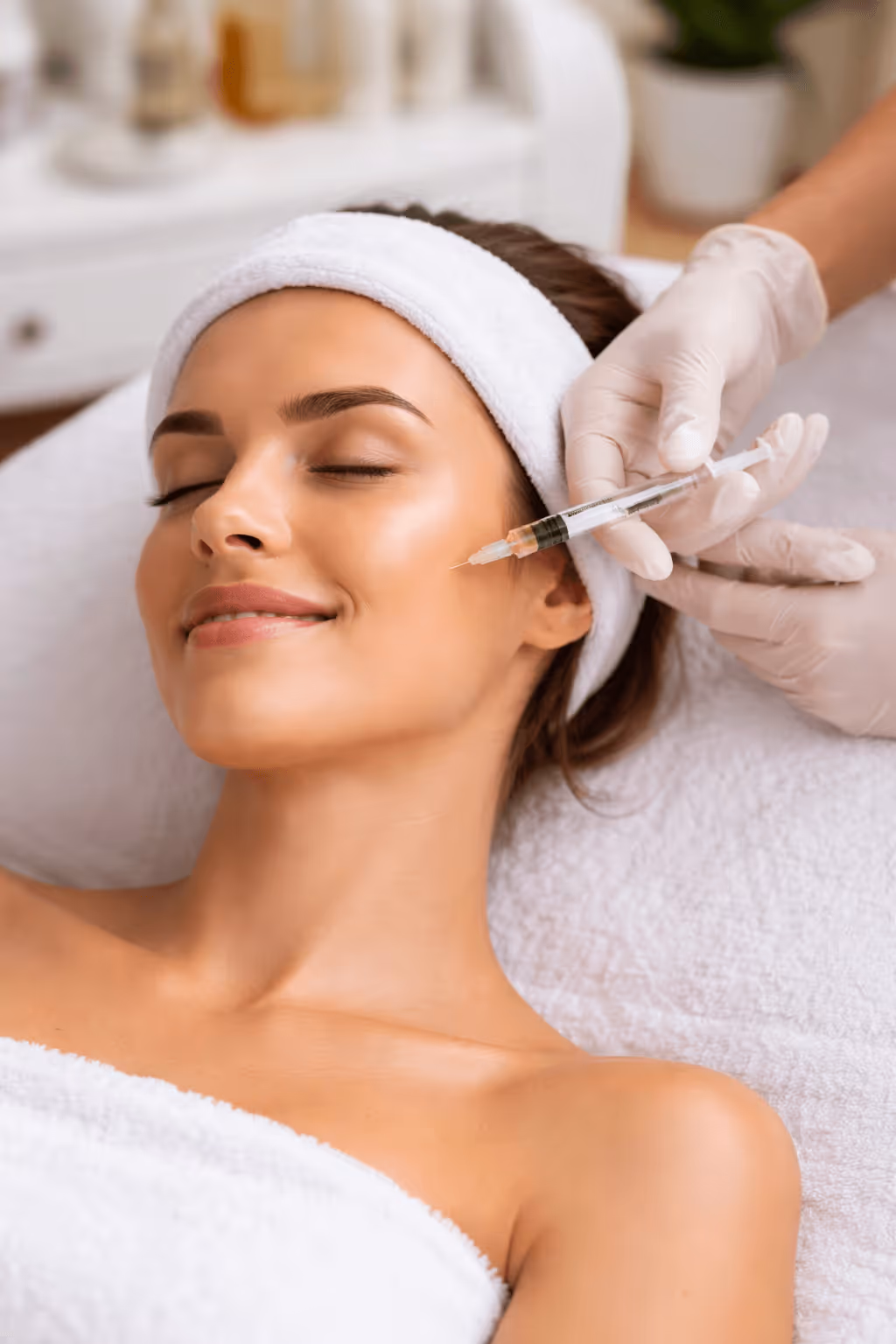 Client receiving an exosome-based regenerative skin treatment at a Manhattan medspa