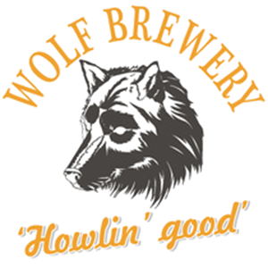 Logo of Wolf Brewery with a detailed wolf head illustration and the slogan 'Howlin' good' in orange text.