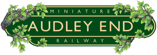 Audley End Miniature Railway logo with green leafy vine decorations on a dark green and gold background.