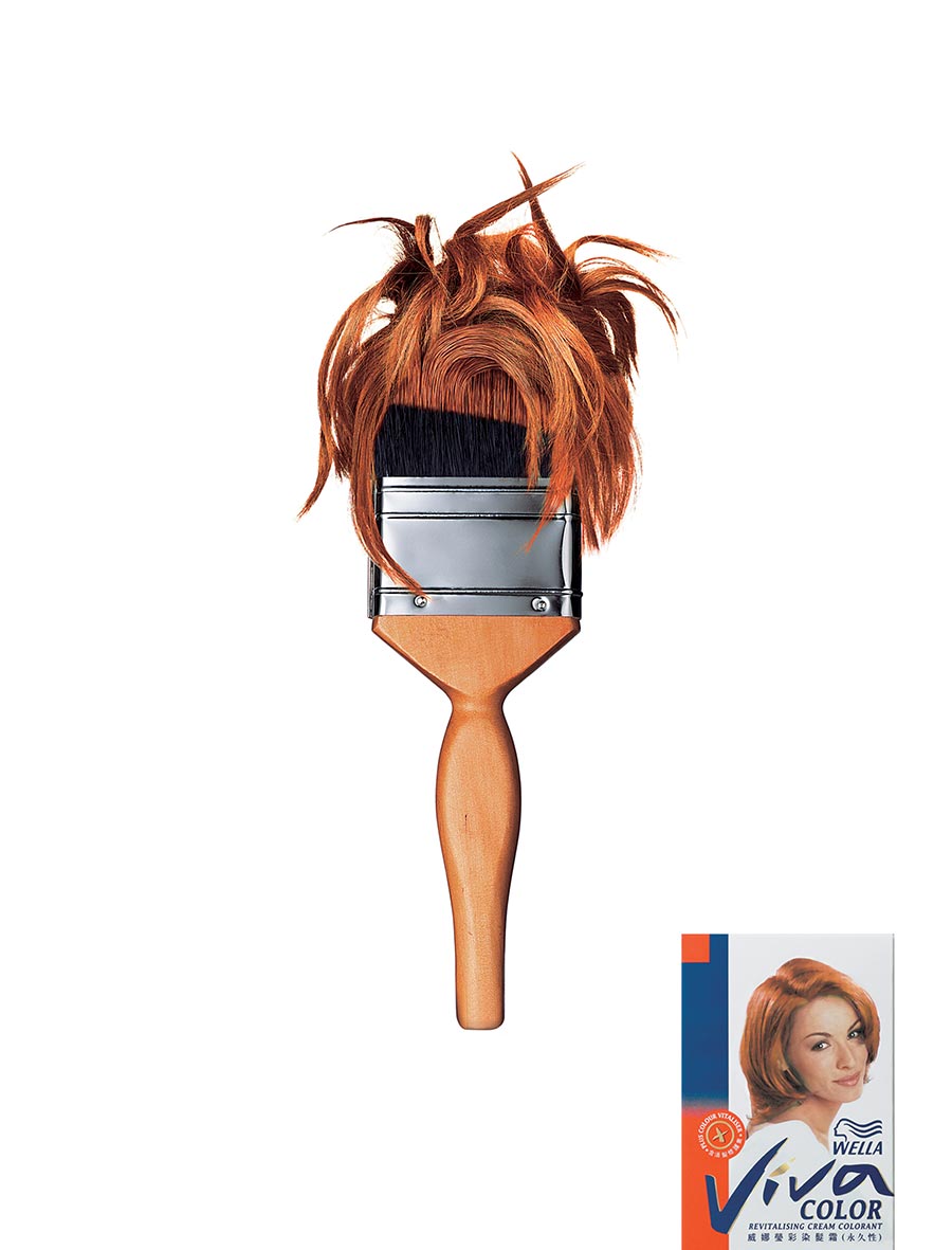 Paintbrush with top of bristles turning into a funky hairdo dyed auburn. Ad for Wella hair dye.