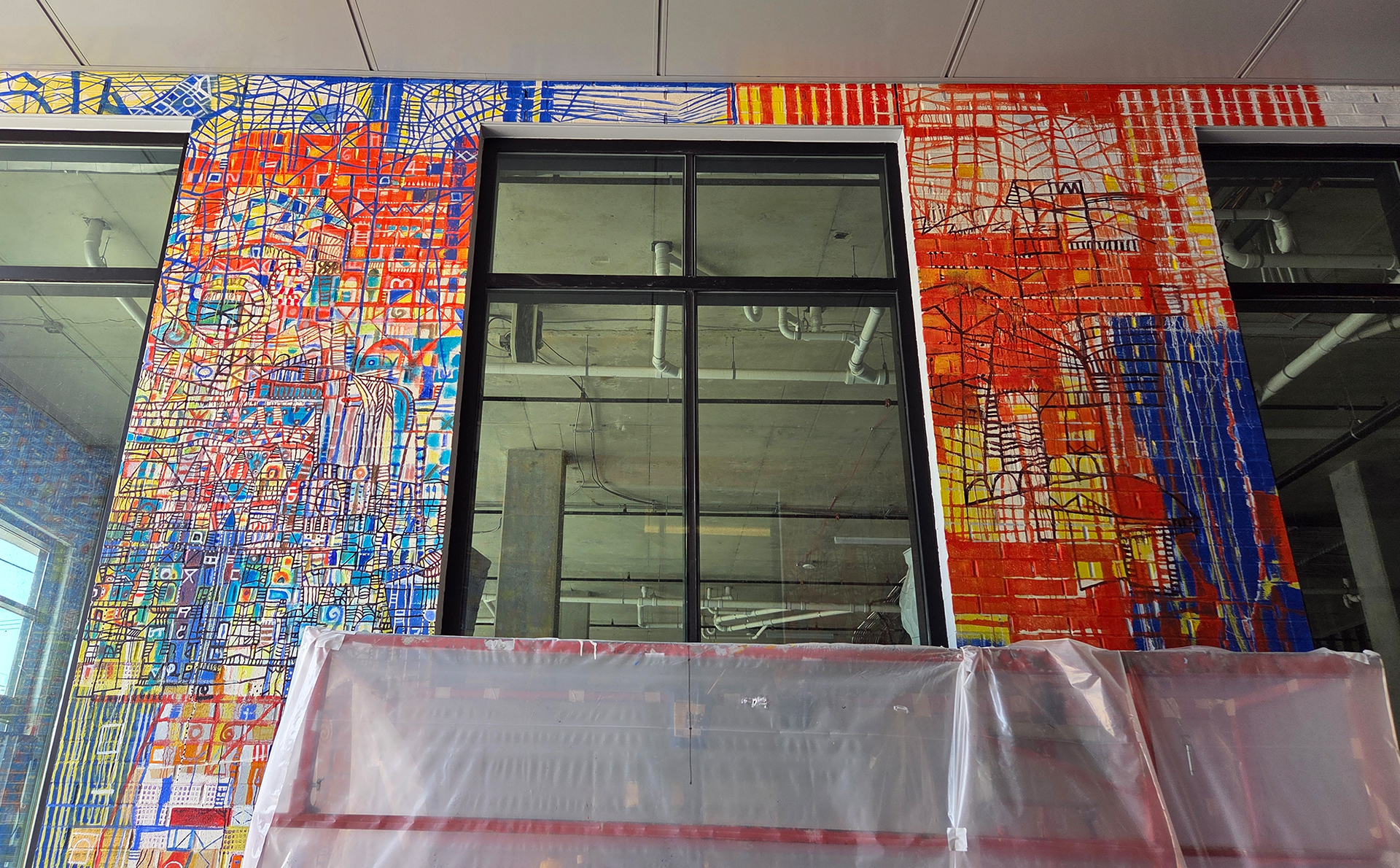 Nearly completed sections of the Freeport Row mural.