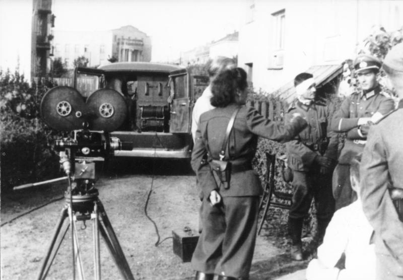Riefenstahl instructing her film crew in Poland, 1939.